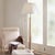 Charleston Floor Lamp, White Washed Wood The bold, architecturally inspired lines of this mango wood floor lamp are...