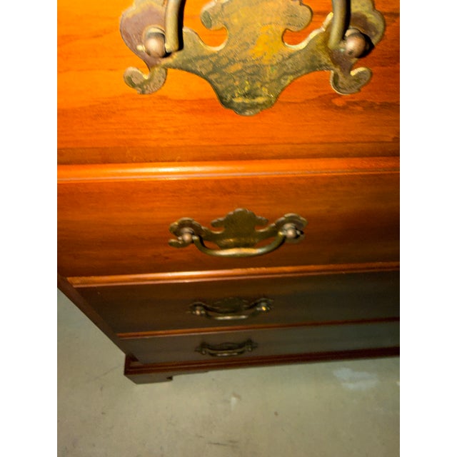 This fine dresser is in your condition. The top has been professionally refinished the body and the guts are in great shape.