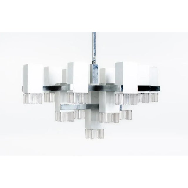 Hanging lamp designed by the Italian Gaetano Sciolari in the 70s (stamp on the lamp, see photo). Structure with brushed...