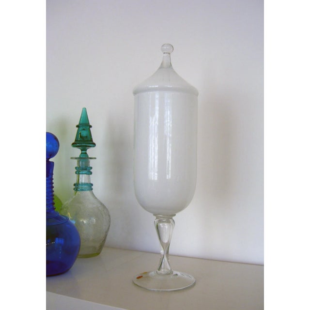 This Murano Italian Cased Glass White Apothecary has a clear stem, which matches the top of the white cased glass lid....