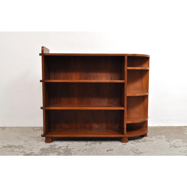 Beautifully designed walnut bookcase. Circa 1930. The bookcase is in excellent condition. Dimensions: W111 cm x D29 cm x...