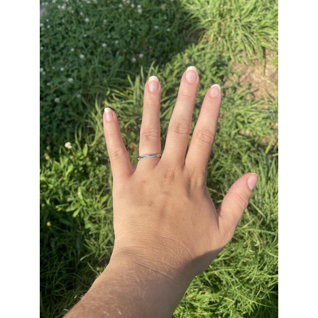 Stones: diamond, 44 round brilliant cut 1.1 mm approximately .40 total carats FG color/ VS1-2 clarity Ring Size 5.75 Rise...