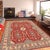 Enhance your home with this exquisite hand-knotted Kazak rug, crafted from fine hand-spun wool and dyed with all-natural...