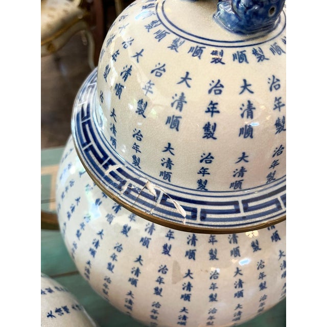 These beautiful chinoiserie jars are quite large. They have some signs of wear, like chipping. But the pieces are in...