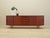 The sideboard was made in the 1970s in Denmark. The structure is covered with teak veneer. The legs are made of solid...