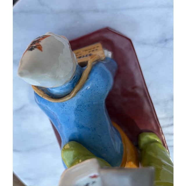 Rare vintage Chinese Cultural Revolution-era porcelain figurine depicting a Red Guard member conducting a public struggle...