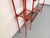 Vintage Italian Bauhaus and post-modernist bookcase from the 1970s, with a red tubular metal and black metal frame, small...