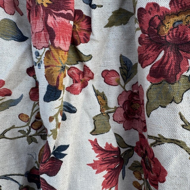 Pair of drapes in the style of Waverly or Schumacher. Fully lined. Heavy. Of a lovely bird and butterfly floral chintz...