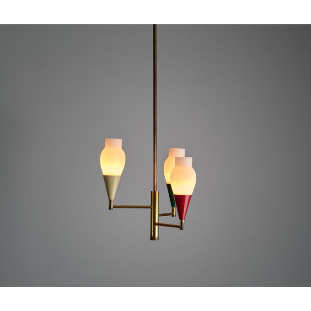 This elegant vintage Italian chandelier, crafted in the 1950s, boasts a modern design with a touch of retro charm. Made...