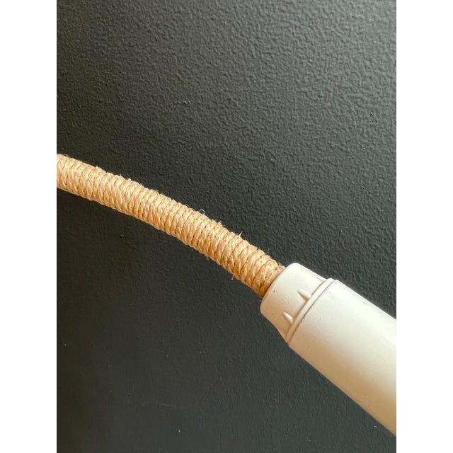 This chandelier with a very nice and unusual design is made of rope. This is a French work. Circa 1970