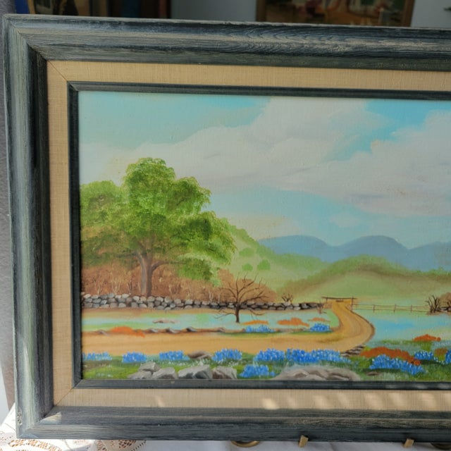 The product is a medium-sized oil painting of a Texas bluebonnets landscape by artist IP Duncan, created in 1980. The...