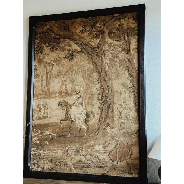 A large and absolutely stunning antique framed English tapestry. This beautiful piece was machine woven in the late...