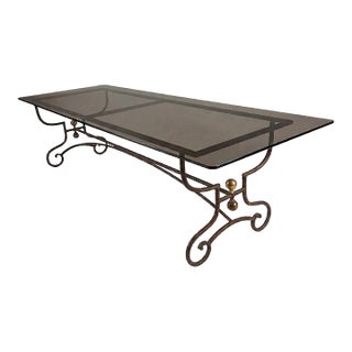 A French 1970s Wrought Iron and Brass Dining Table With Smoked Glass Top For Sale