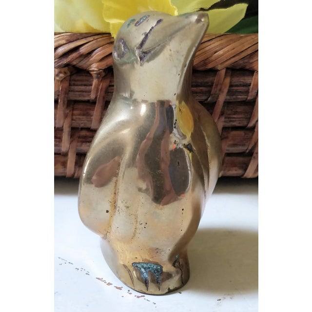 Vintage solid penguin paperweight. Would look cute on a desk or even as shelf decor. Original patina left intact. A must...