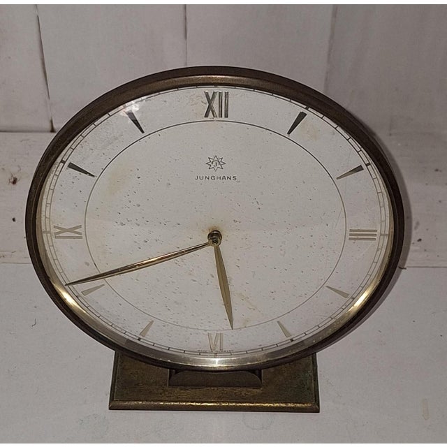 Vintage German Art Deco Table Clock by Junghans, 1930s, in Very Good conditions. Designed 1920 to 1949 This piece has an...
