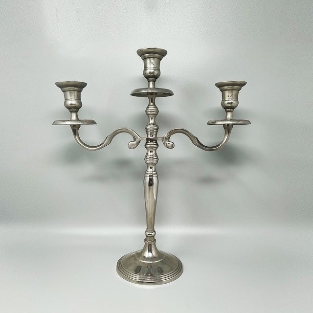1950s Stunning candelabra for three candles in stainless steel. Handmade, in excellent condition. Made in Italy Dimension:...