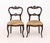 Pair of Victorian Silk Upholstered Walnut Side Chairs. 32" H x 17.5" W x 18.5" D; seat: 18" H. Provenance: The Estate of...