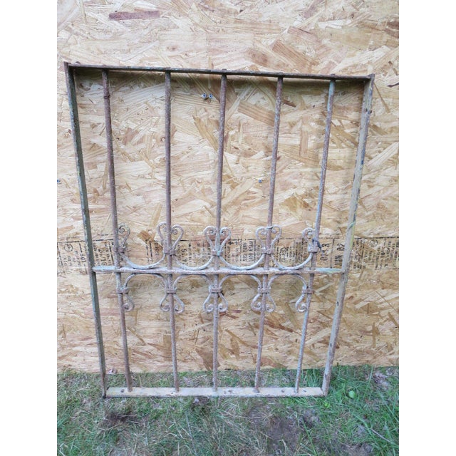 A piece of architectural salvage. Heavy and sturdy. Piece does show signs of age related wear including rust, flaking...