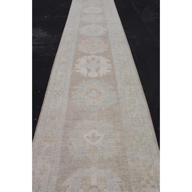 Textile Long Soft Oushak Runner With Sand Field and Pale Green and Blue Accents For Sale - Image 7 of 12