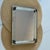 The vintage Mirrored Dresser Vanity Tray features a sleek design with lucite rails, brass accents with a footed bottom,...