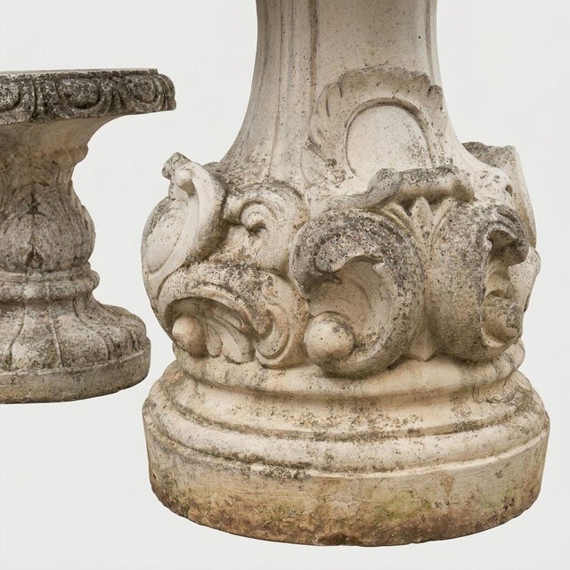 A charming French garden set comprising a circular table and a pair of matching stools, crafted from high-density...