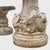 A charming French garden set comprising a circular table and a pair of matching stools, crafted from high-density...