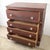 The American Empire chest of drawers represents one of the most confident furniture statements of the nineteenth century,...