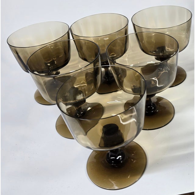 These gorgeous spicy nutmeg coupes are anything but plain brown. From the stylish cut of the stem to the top of the optic...