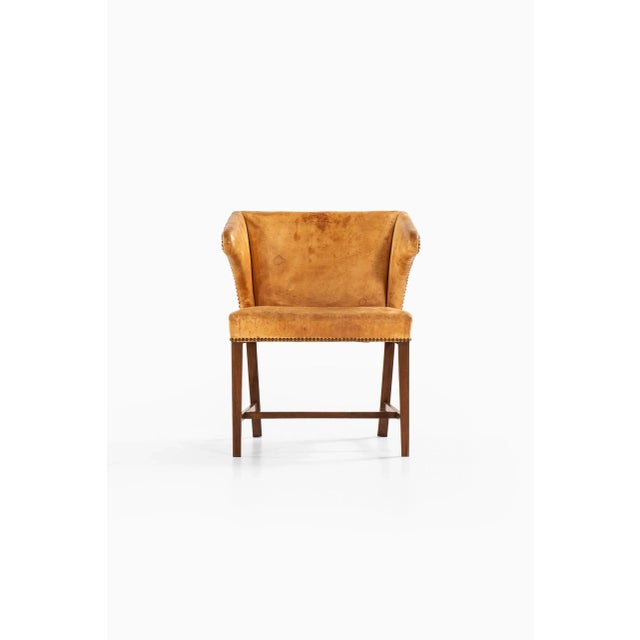 Very rare armchair attributed to Frits Henningsen. Produced by cabinetmaker Frits Henningsen in Denmark.