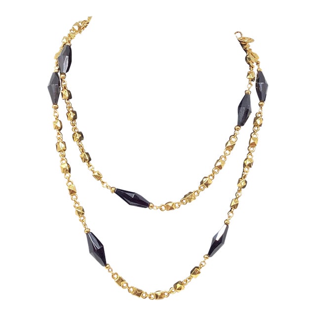 1980s St. John Opera Length 42" Gold Plated & Black Faceted Bead Necklace For Sale