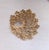 1966 goldtone filigree openwork brooch with security clasp. Marked "MONET©" on the back. Measure: 3 1/4 inches by 2 7/8...