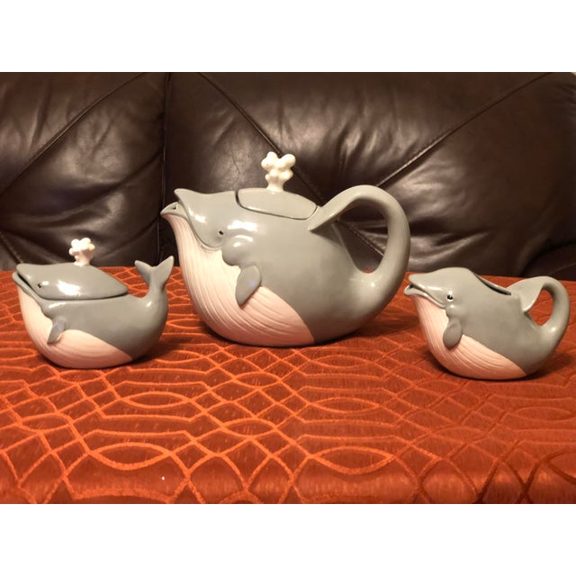 Bring a splash of whimsical nautical charm to your tea service or shelf styling with this vintage three-piece ceramic...