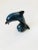 A vintage pottery dolphin made by Blue Mountain Pottery of Canada. Beautiful variation to the dark blue glaze.