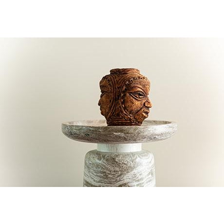 This captivating afrobohemian vibe clay sculpture brings both character and mystery to any space. Whether displayed on a...