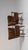 A brown wood, Mid-Century Modern-style armchair, dating to the 1940s and made in Denmark. The wood frame is finished in...