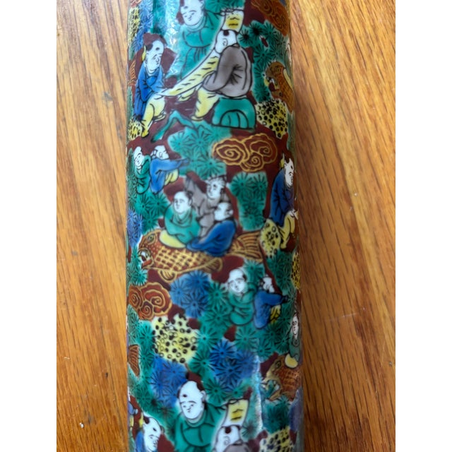 Elevate your tabletop or shelving display with this exquisite vintage Japanese Kutani porcelain cylinder vase. This 8-inch...