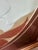 There's a quiet richness to this piece that photos almost can't capture — embossed roses rendered in warm autumn tones of...
