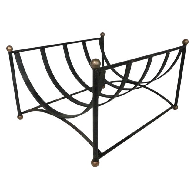 Stylish wrought iron log holder, with brass colored plastic ball finials. This example is in very fine original condition,...