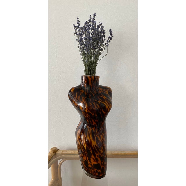 Handblown Murano Style Glass Vase in Female Torso Form. Vintage sculpture hand crafted in Murano, Italy in the 1970s. A...
