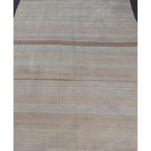 Measures: 5'0 x 8'11 Vintage Turkish Kilim Rug With Earthy Pastel Stripes 5'0 x 8'11. Keivan Woven Arts / Rug / EN-15269...