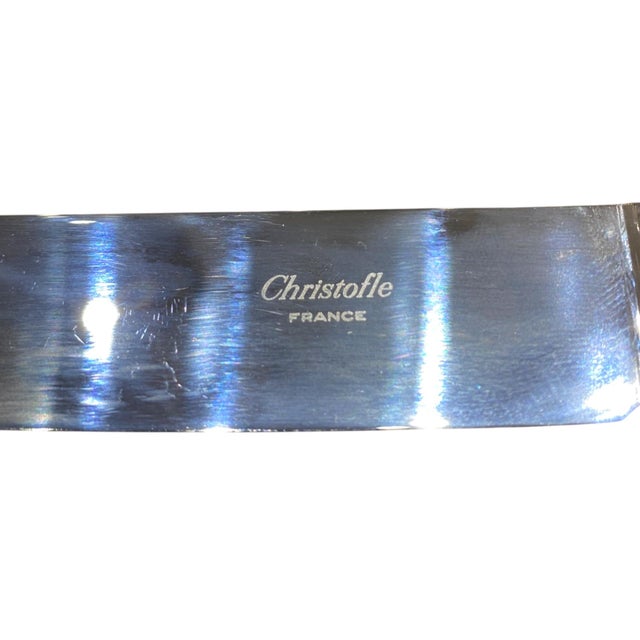 Elegant vintage flatware set in the Christofle Aria pattern, comprising a complete mix of dining and serving pieces: a...