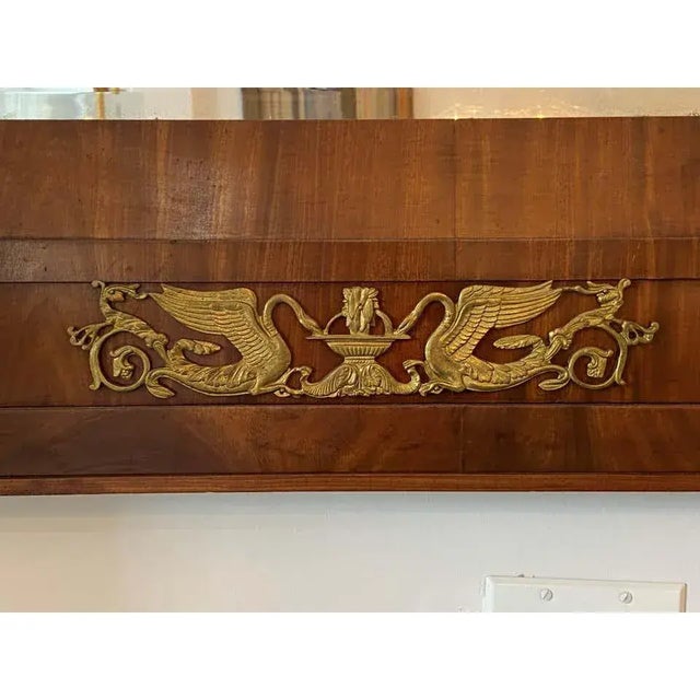 This French Empire trumeau mirror dates to the 1810s and was acquired from an estate in Albany, NY. Retains its original...
