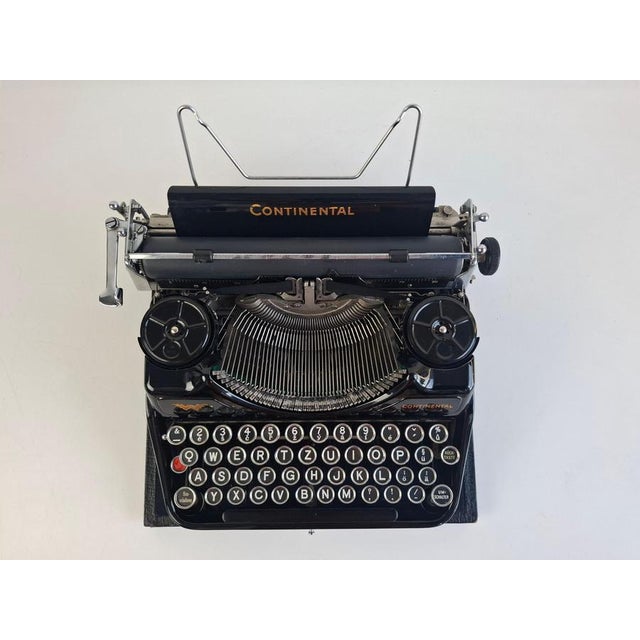 Art deco continental portable typewriter manufactured by wanderer-werke in germany, circa 1930. This elegant machine...
