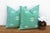 Sold as a matching pair, these handcrafted Moroccan cactus silk pillows feature scattered star motifs and a central...