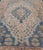 Shabby Chic Antique Turkish Oushak Rug in Rich Blues and Earth Tones For Sale - Image 3 of 10