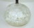 Currey & Company's 'Odette' table lamp has an eye catching organic design with quartz crystals encased in an acrylic orb-...