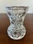 A delightful vintage pressed glass toothpick holder featuring a faceted diamond motif, pedestal base, and softly scalloped...
