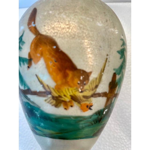 A pair of hand blown mercury glass vases, with hand painted hunting scenes of fox with game birds. 19th century. No chips...