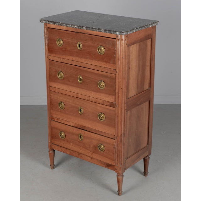 An authentic 18th-century French Louis XVI period chiffonier, or small gentleman's chest, from Alsace. Crafted from solid...