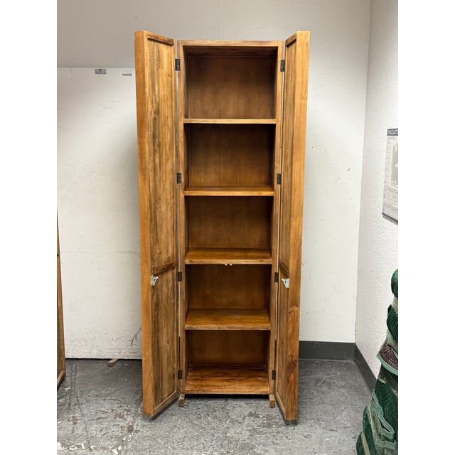 Design Plus Gallery presents a Storage Cabinet from Roost. Built from solid teak wood, this tall & narrow cabinet is...